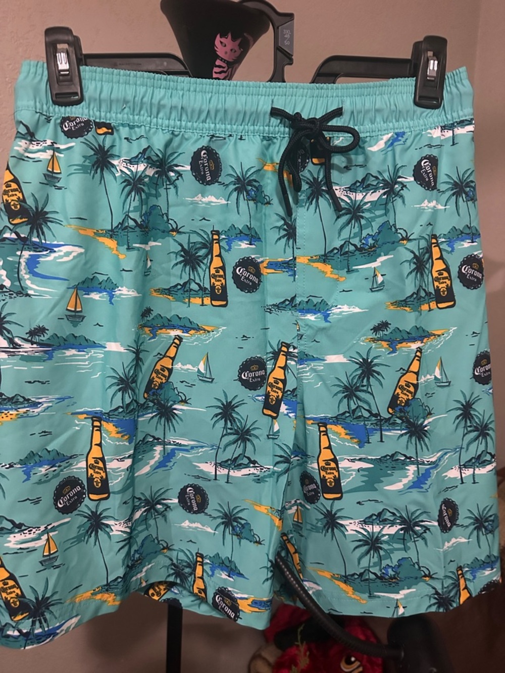 Corona Teal Swim Trunks with Tropical Bottle Print